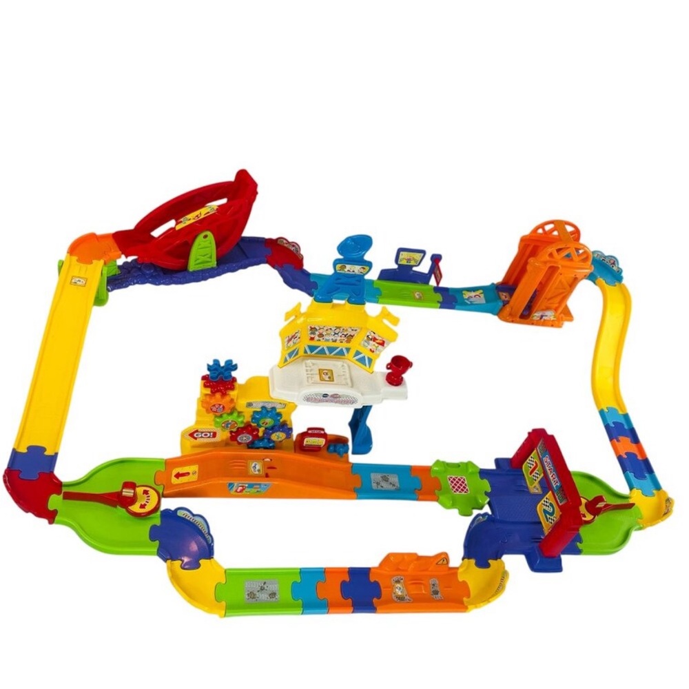 2 sets of Go! Go! Smart Wheels. Train Station Playset and speed car racer